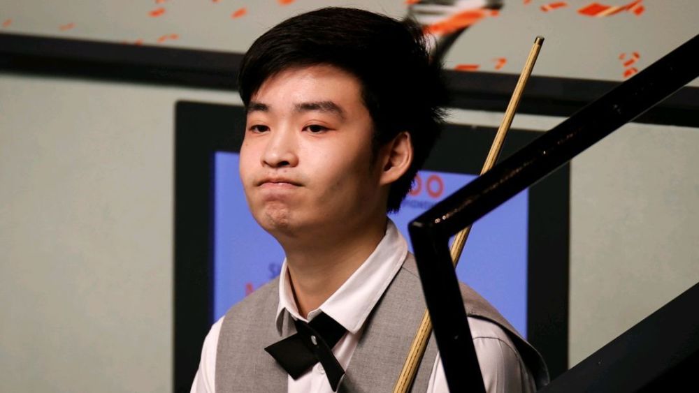 她以坚定信 她以坚定信